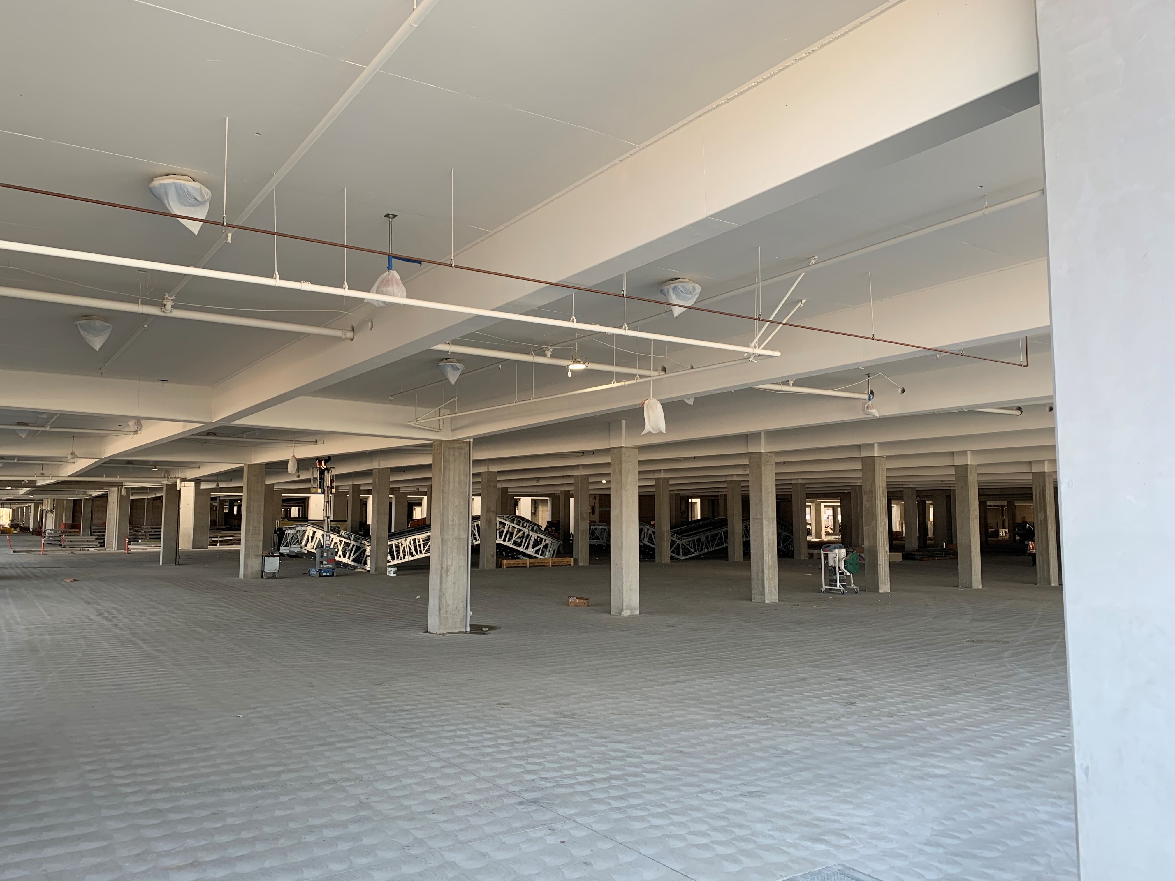 The first floor of the Intermodal Transportation Facility-West and escalators waiting to be installed.